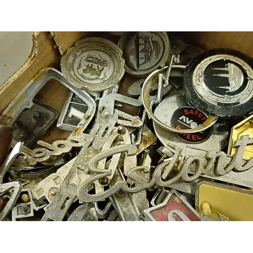 54 - Assorted motoring badges, including Ford, Hillman, BMW, Daimler and others (box)
