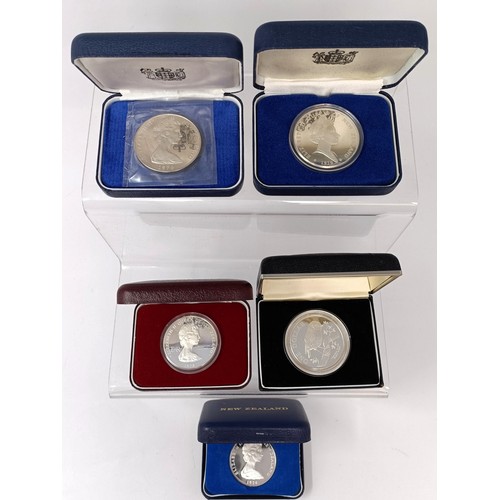 238 - A New Zealand silver proof dollar coin, 1984, and four others similar (5)...