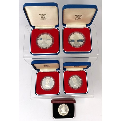 242 - A group of silver proof commemorative and other coins...
