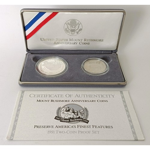 244 - Two United States Liberty coins, 1886-1986, two United States Mount Rushmore Anniversary Coins 1991,...