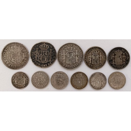 257 - Eleven Spanish silver coins, 2 pesetas to 50 cents, 1764-1926...