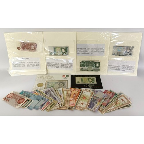 251 - A group of assorted UK and world banknotes, over one hundred and twenty, and a five pound coin set c...