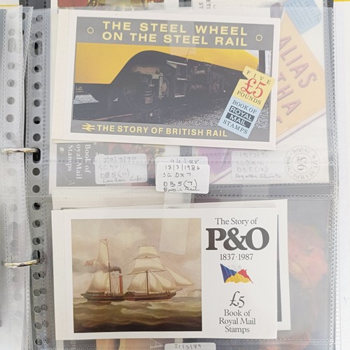 226 - A collection of Royal Mail Prestige booklets, 1980-2004, in an album...