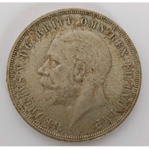 243 - A crown, 1935, other assorted coins and medallions...