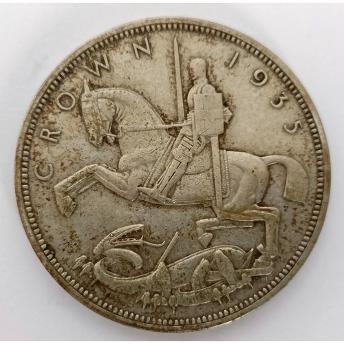 243 - A crown, 1935, other assorted coins and medallions...