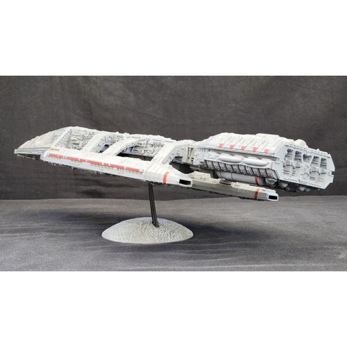 360 - A collection of assembled model kits, including Battlestar Galactica, Thunderbirds 2, Marvin (Hitchh...