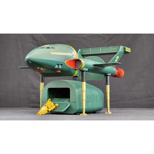 360 - A collection of assembled model kits, including Battlestar Galactica, Thunderbirds 2, Marvin (Hitchh...