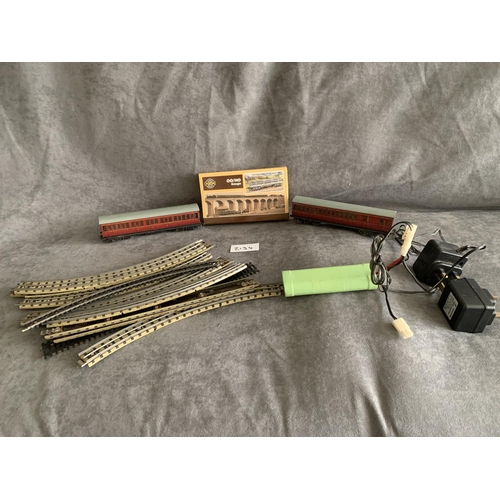 576 - Mixed lot of 00 gauge Track, powere packs, carridges and a model as picturedMixed lot of 00 gauge Tr... 