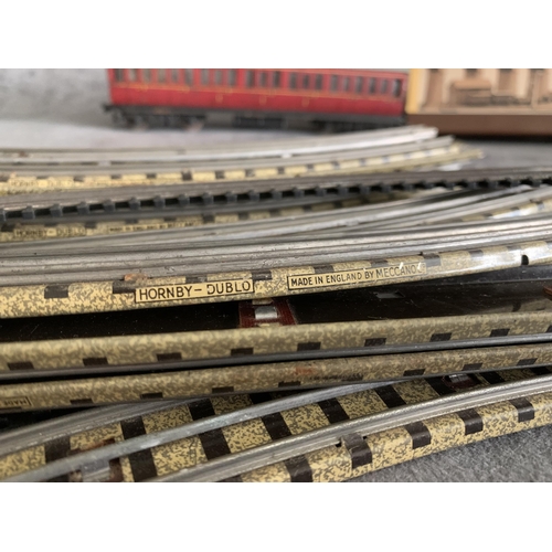 576 - Mixed lot of 00 gauge Track, powere packs, carridges and a model as picturedMixed lot of 00 gauge Tr... 