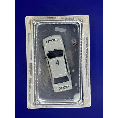 12 - James Bond Scale Diecast, Unopened Bubble Card. BMW 516 Police Car. Octopussy