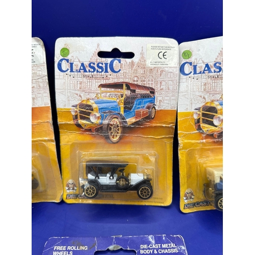 133 - 4 x diecasts on card, one street scenes, black cab and three classics. Item number 30106