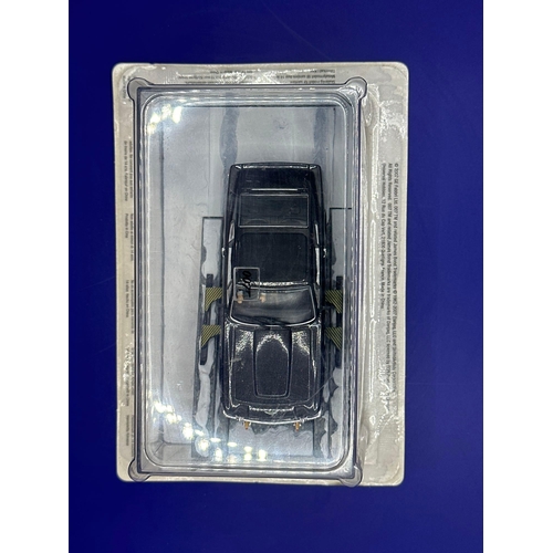 14 - James Bond Scale Diecast, Unopened Bubble Card. Aston Martin V8 Vantage. The Living Daylights.