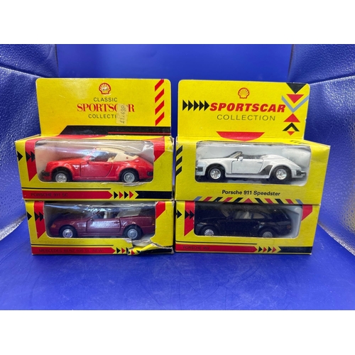 144 - 4 x Classic Sports Car Collection by Shell Garage. Mercedes-Benz 500 SL (new), Porsche 911 SC, Porsc... 