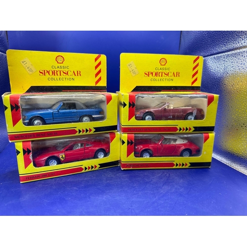 148 - 4 x Classic Sports Car Collection by Shell Garage. Mercedes-Benz 500 SL (new), Porsche 911 SE, Merce... 