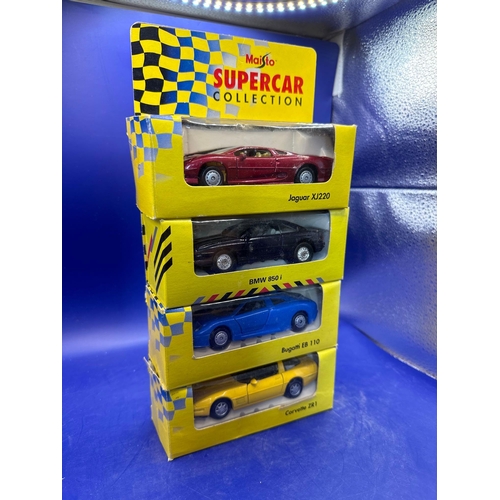 150 - 4 x Maisto Classic Sports Car Collection. Bugatti EB 110, Jaguar XJ220, BMW 850I, Corvette ZR1