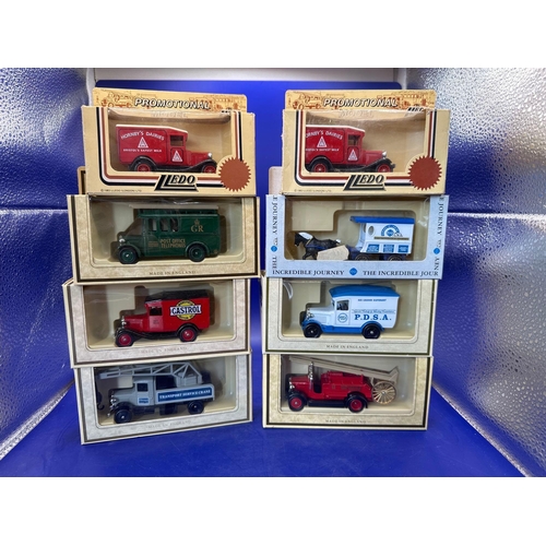 157 - 8 x Lledo Diecasts, with various branding Hornby dairies times 2GR post office telephones, Castrol m... 