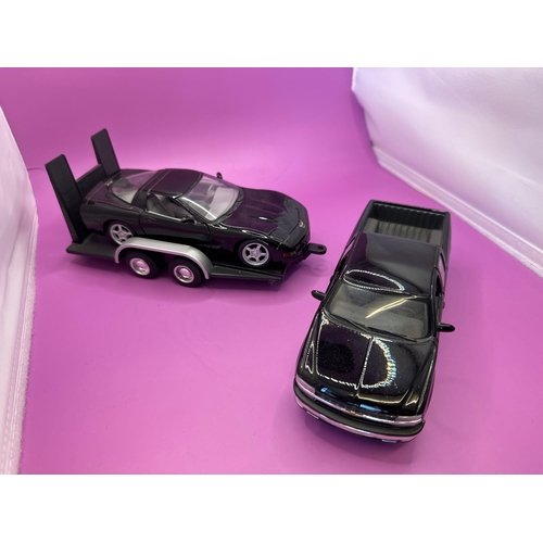 208 - Maisto 1:27 scale unboxed Diecast 1998 Chevrolet Silverado with trailer and 1997 Corvette on trailer