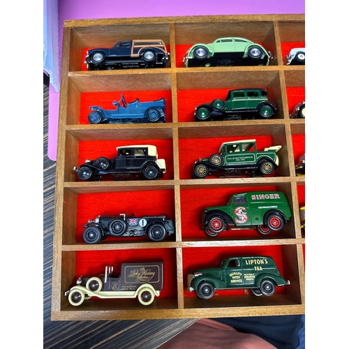 213 - 15 car display filled with Lledo models as pictured.