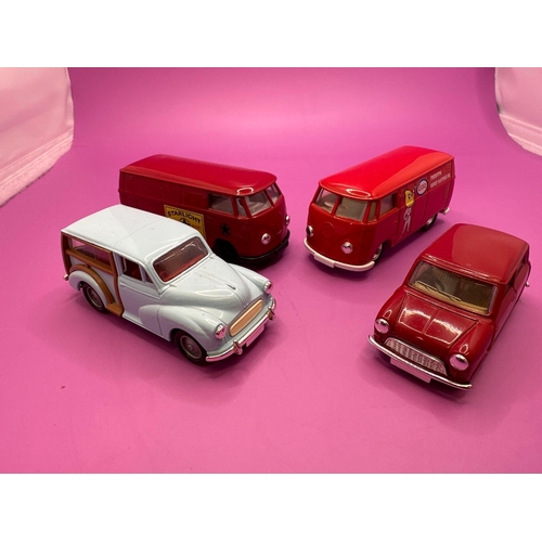 215 - 4 Lledo Days gone Diecasts, 2 VW Splitscreen Vans, a mini and a morris minor.