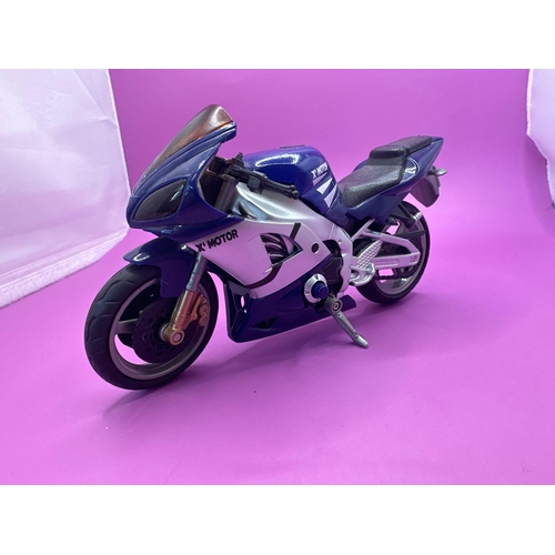 238 - 4 x made in China plastic Motorcycle models