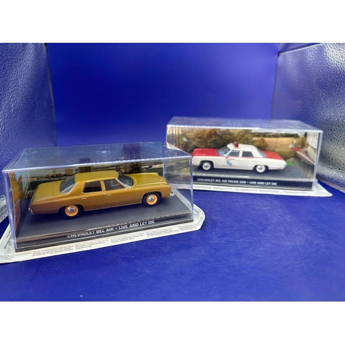 84 - 2 x James Bond Scale Diecast, Unopened Bubble Card. Chevrolet, Bel-Air and Chevrolet Belair police c... 