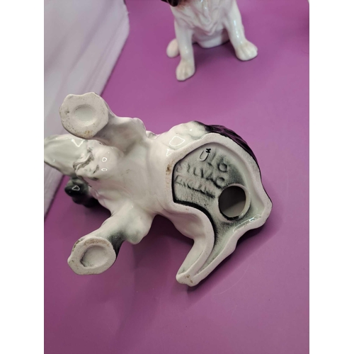 541 - A collection of porcelain dogs designers in pictures