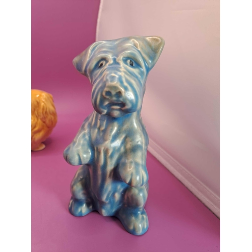 541 - A collection of porcelain dogs designers in pictures