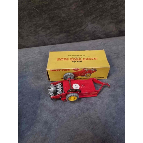 267 - Dinky Toys diecast #321 Massey-Harris Manure Spreader in box (one end both tabs and flap missing)