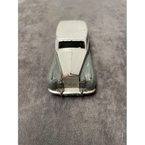 271 - Dinky Toys Diecast #150 Rolls-Royce Siilver Wraith in two tone grey with spun hubs in box (one end n... 