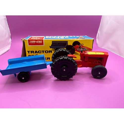 103 - Lone Star Farm King, Tractor and Trailer. A red tractor with blue trailer. Made in England by Lone S... 