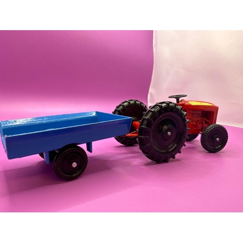 103 - Lone Star Farm King, Tractor and Trailer. A red tractor with blue trailer. Made in England by Lone S... 