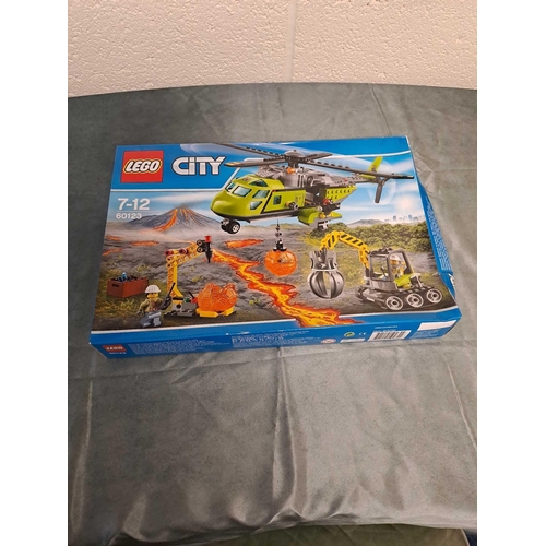 21 - Lego city set number 60123 volcano supply helicopter Box has slight crushing unopened
