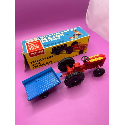 103 - Lone Star Farm King, Tractor and Trailer. A red tractor with blue trailer. Made in England by Lone S... 