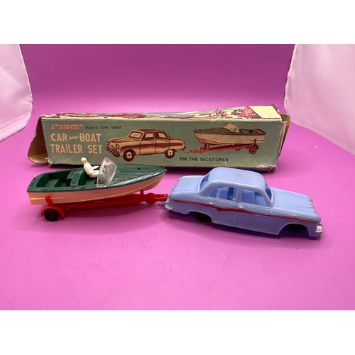 126 - Blue box, plastic toys, series, car and boat trailer set made in Hong Kong catalogue number 7458A.