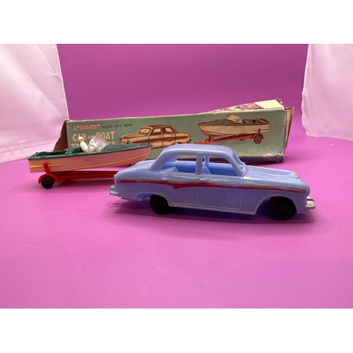126 - Blue box, plastic toys, series, car and boat trailer set made in Hong Kong catalogue number 7458A.