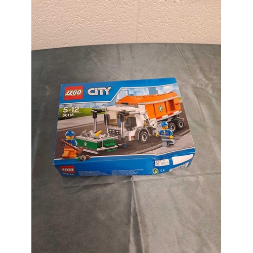 23 - Lego city set number 60118 garbage truck Box has slight crushing unopened