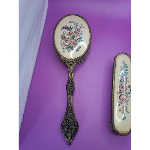 573 - Vintage Antique Brass Vanity Set Comprising Of A Mirror And 2 Brushes With Embroidered Pattern On Ea... 