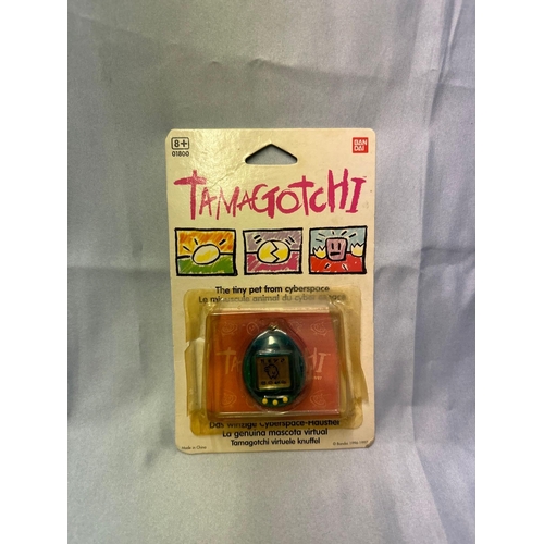 7 - 1 Tamagotchi Damaged Box Never Been Used