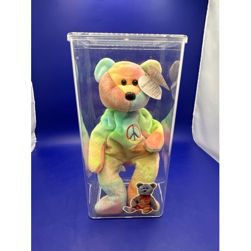 10 - TY Peace Beanie Bear hand made in China. DOB 1/2/1996 in Perspex case.