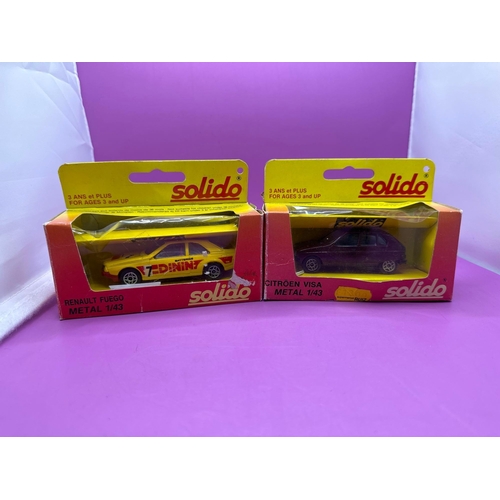 115 - 2 x Solido Models Reynold Fuego in yellow with decals and a citron Visa in burgundy