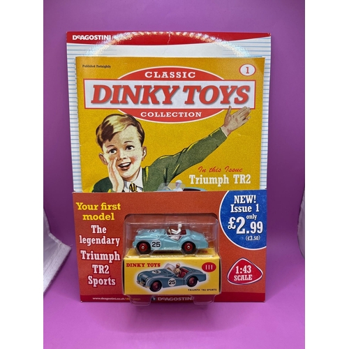 125 - Dinky Toys Comic and Vehicle manufactured by Norev. Comes with Triumph TR2 sports car with number 25... 