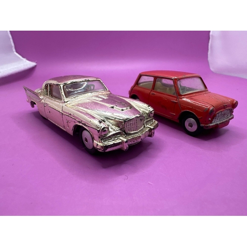 131 - 2 x unboxed Corgi toys Studebaker, Golden Hook, model 211S and corgi Toys Austin seven in red