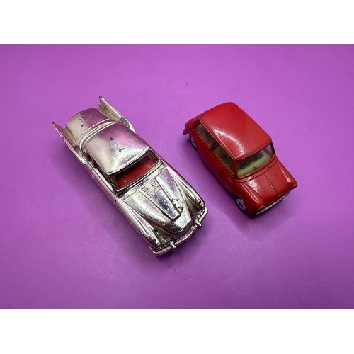 131 - 2 x unboxed Corgi toys Studebaker, Golden Hook, model 211S and corgi Toys Austin seven in red