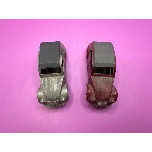 135 - 2x dinky toys, unbox models, Citroen, 2CV, one in grey one in burgundy.