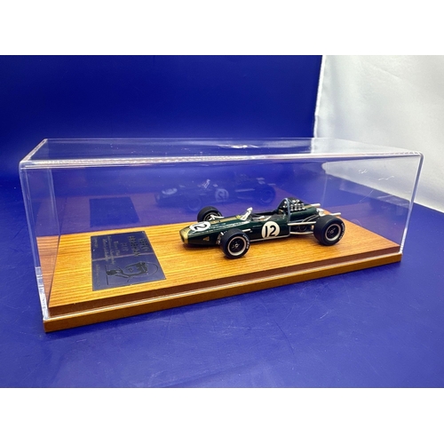 144 - Top Gear Legends Jack Brabham 1966 F1 World Champion. 1:43 Diecasts in box and Perspex case.