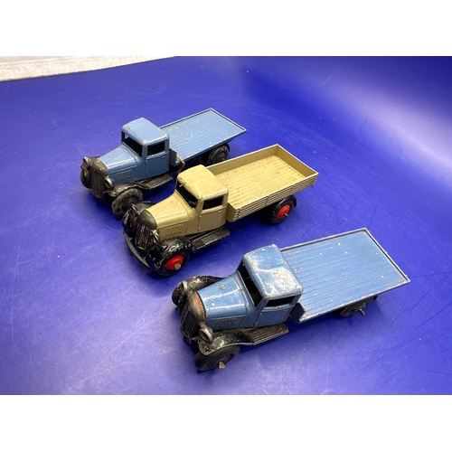 153 - 3 x Dinky flat Bed Trucks as pictured. Unboxed.