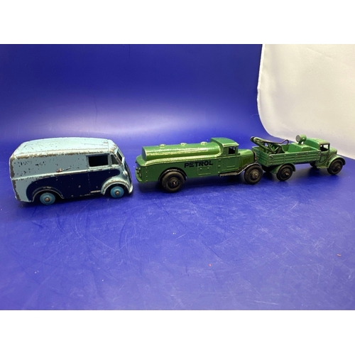 154 - 3 x dinky toys trucks. One includes Morris 10 CWT van in blue petrol, tankering, green and crane a t... 