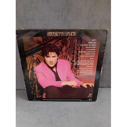 389 - 9 x Shakin Stevens vinyls as pictured