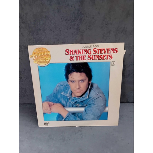 389 - 9 x Shakin Stevens vinyls as pictured