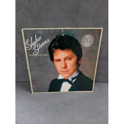 389 - 9 x Shakin Stevens vinyls as pictured